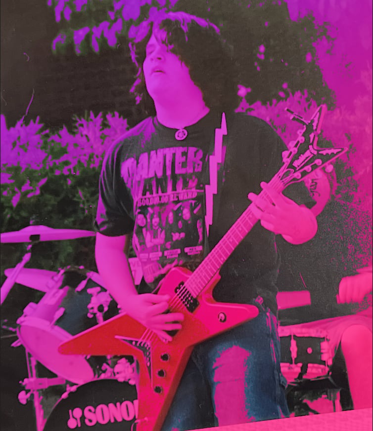 Cody playing in Lachrymose - May 2003